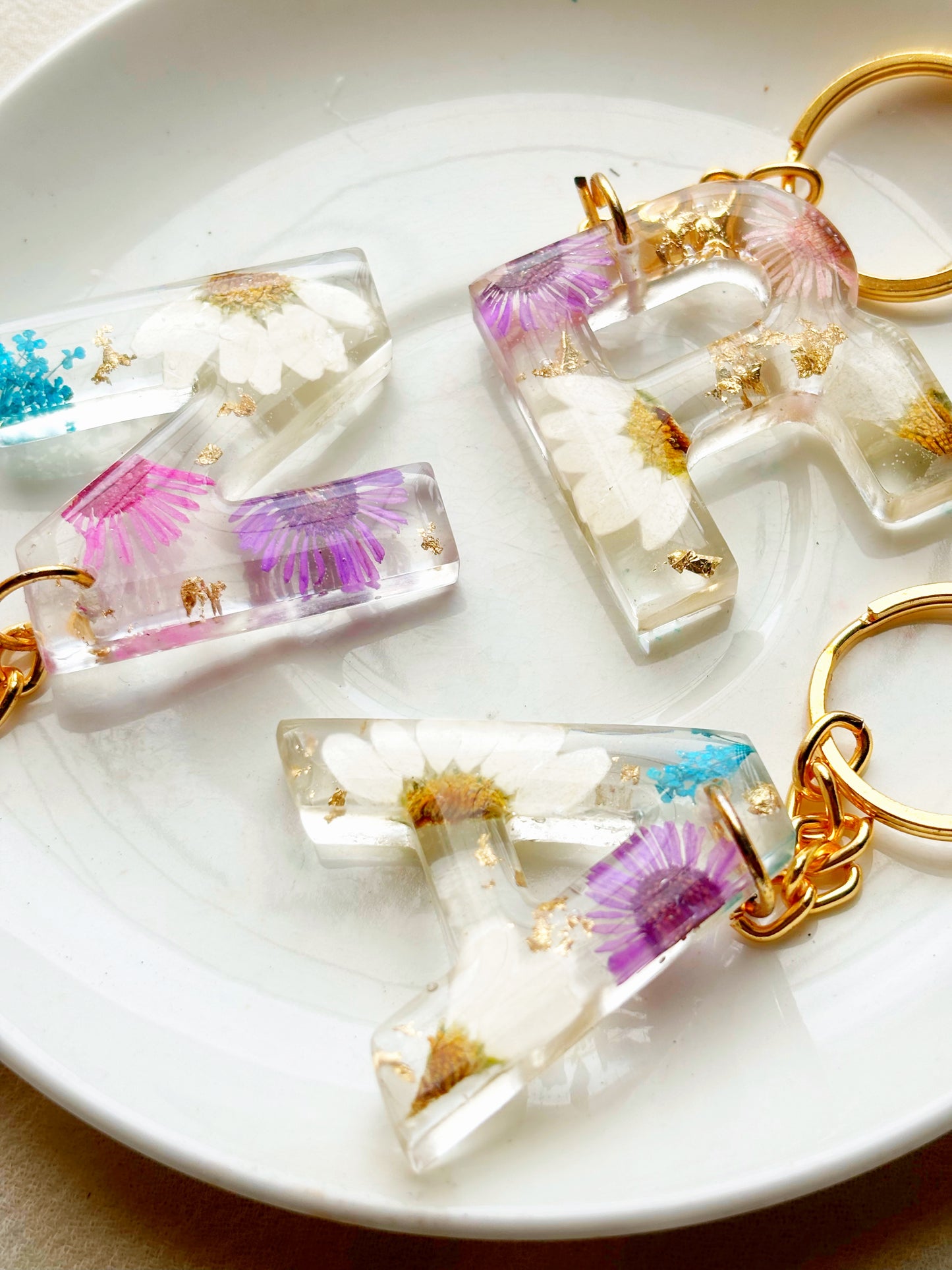 INITIAL KEYRINGS